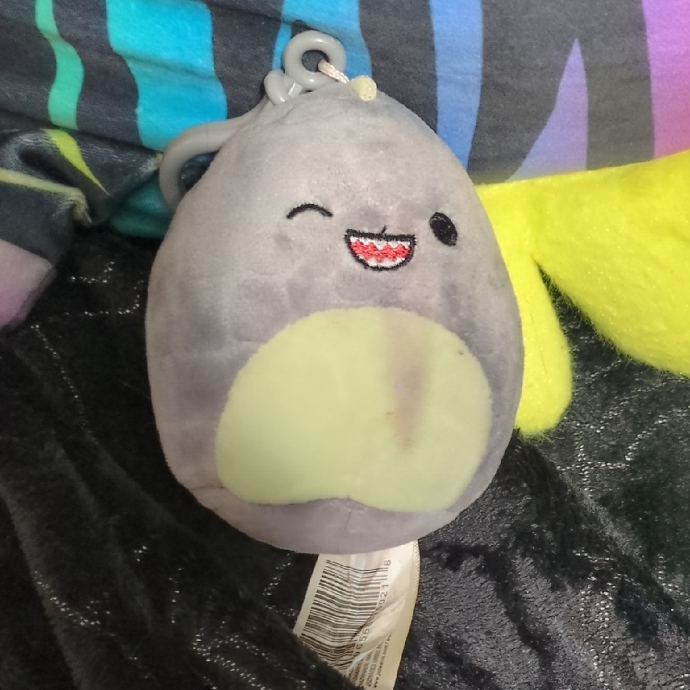 Gray and Yellow Plush Toy